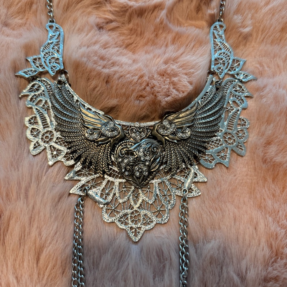 Silver gothic boho winged heart necklace